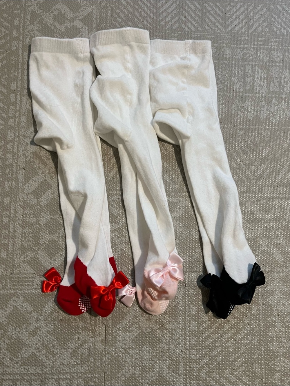 White Girls' Tights with Red, Pink, and Black Bow and Shoe Accent design